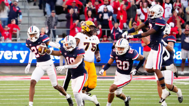 Arizona football players celebrate during game against Arizona State.